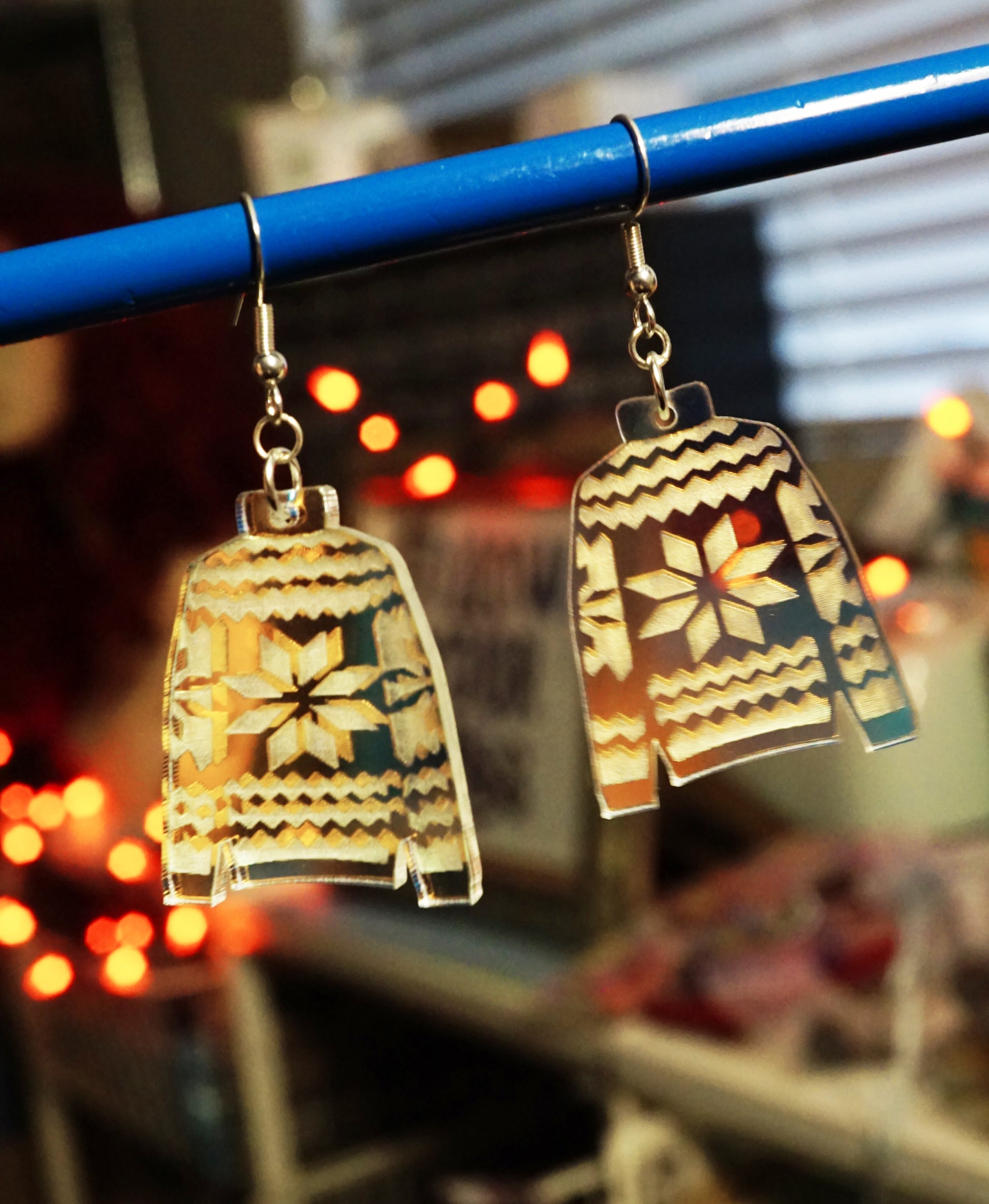 iredescent sweaters as earrings, dangling