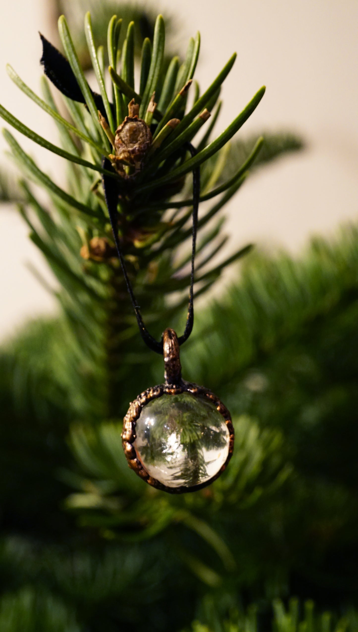clear crystal hanging ornament on tree