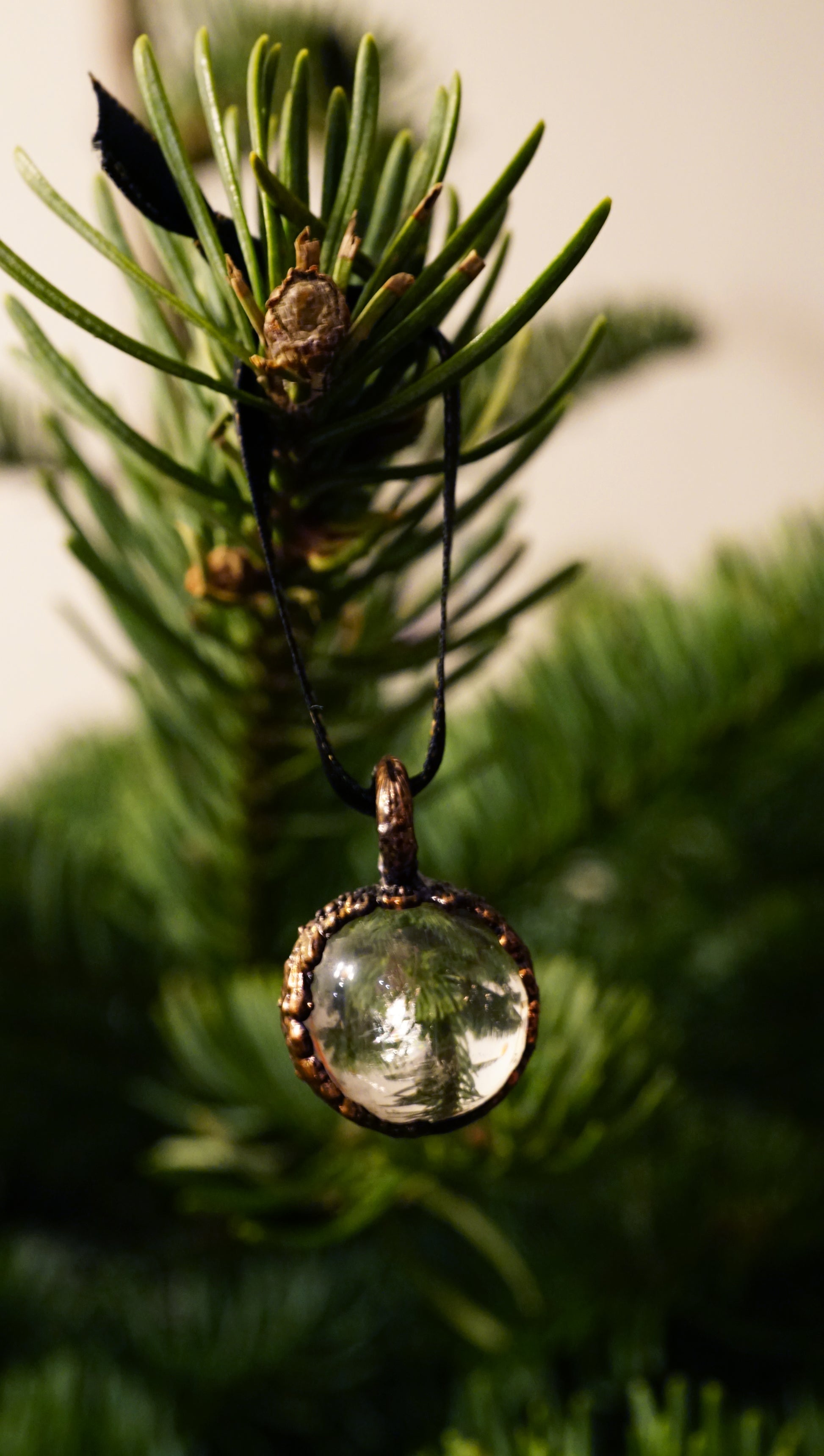 clear crystal hanging ornament on tree