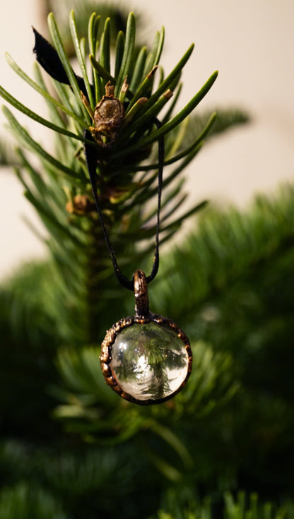 clear crystal hanging ornament on tree