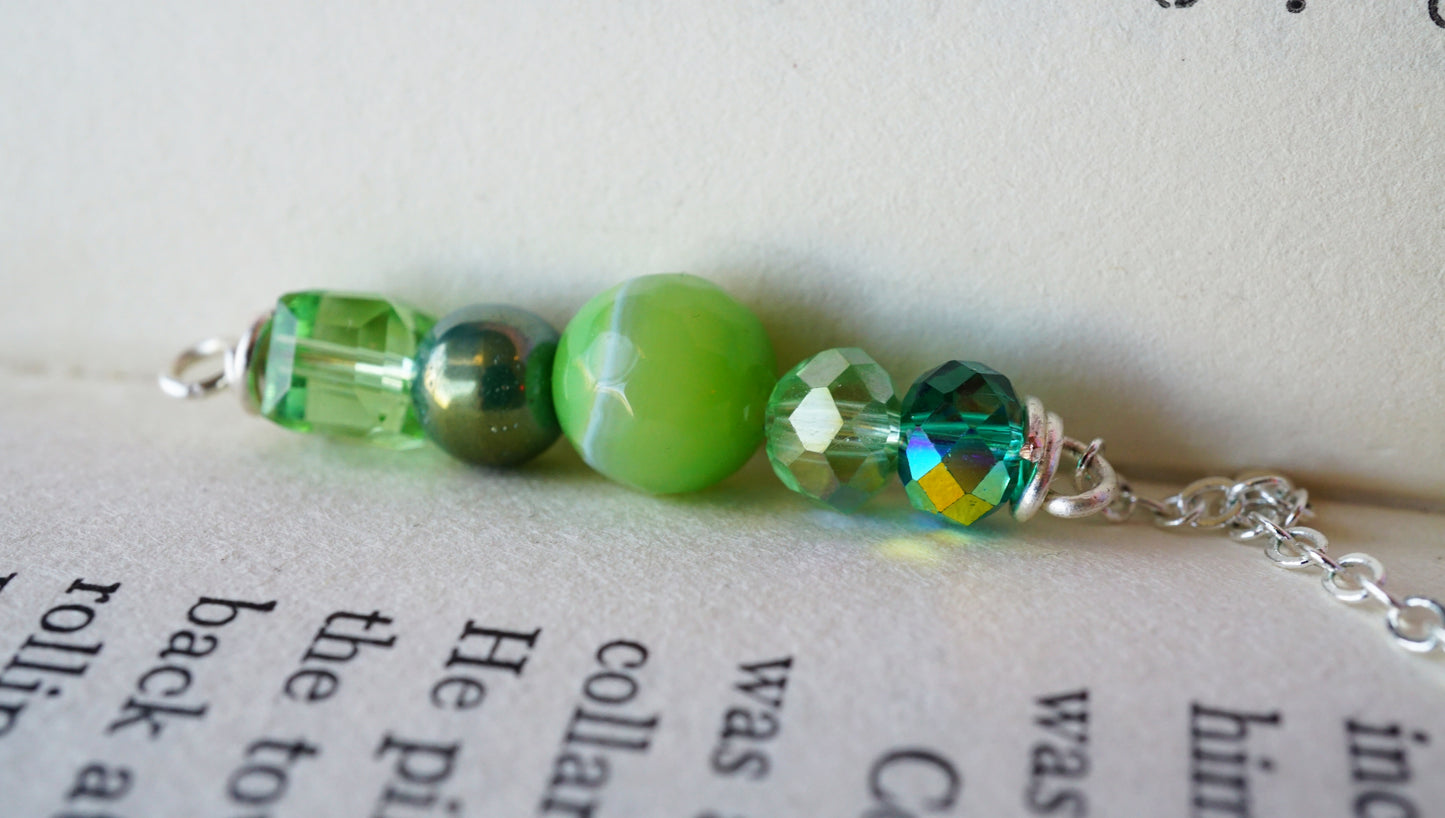 green beaded detail with glass beads and crystals