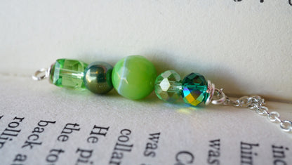 green beaded detail with glass beads and crystals